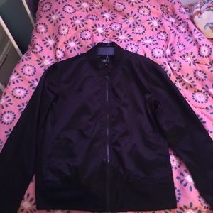 Black windbreaker